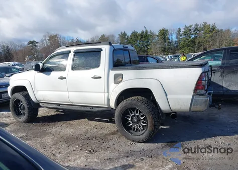 2015 Toyota Tacoma Base V6 z USA, uszkodzony, nr VIN 3TMLU4EN5FM172706